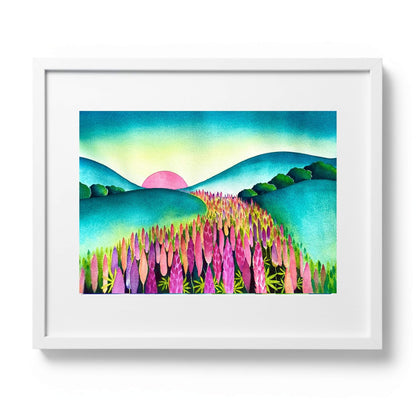Original watercolour painting of pink and purple lupins in a NZ landscape at sunrise with teal rolling hills, by Raewyn Harris, 67 × 52cm, presented in a white frame.

