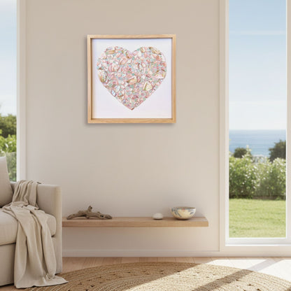Steffi Tregenna A Mermaid's Love shell and sea glass heart artwork hung in a warm coastal New Zealand home interior, Red Peach Gallery Napier
