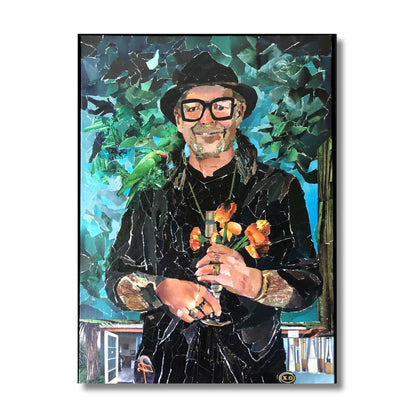 Framed original ripped paper collage portrait of a man in a black hat with a green parrot and orange flowers by Janice Corbishley, 54 x 74cm, titled Monday Painter
