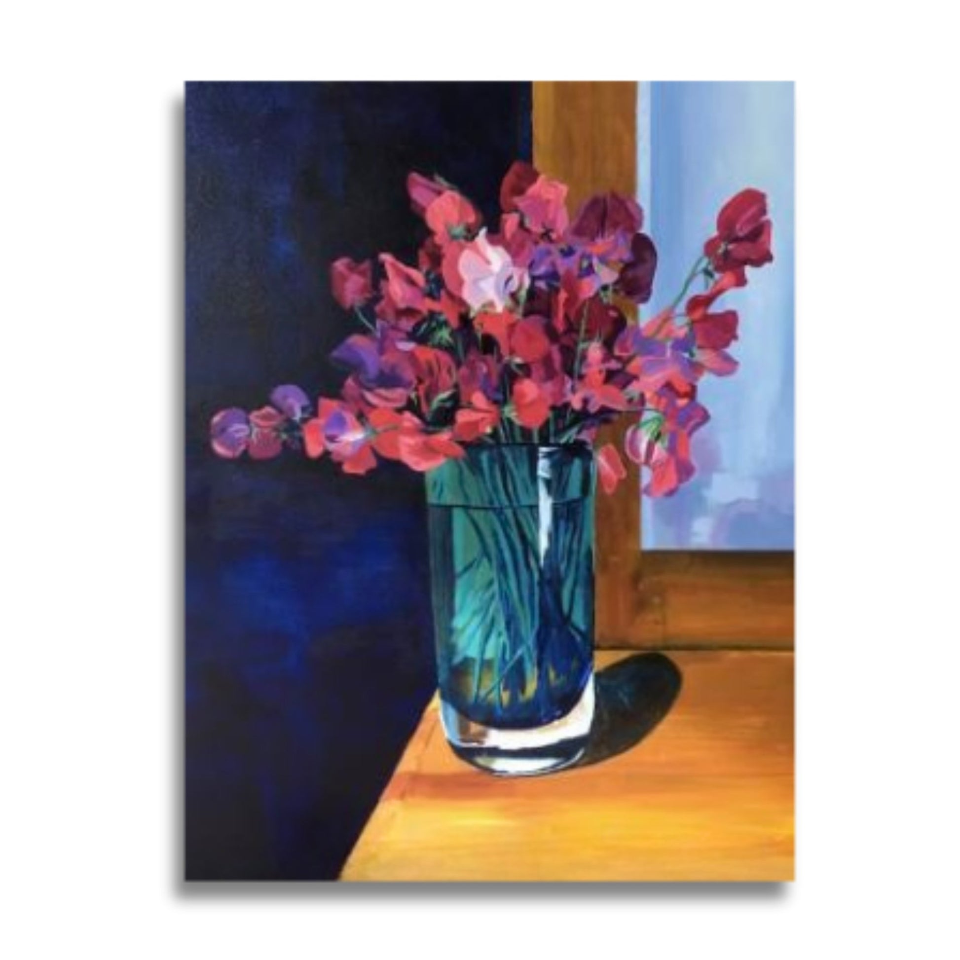 Still life painting of sweet pea flowers in a glass vase, set on a wooden table with a blue wall and timber door in the background. Portrait layout.