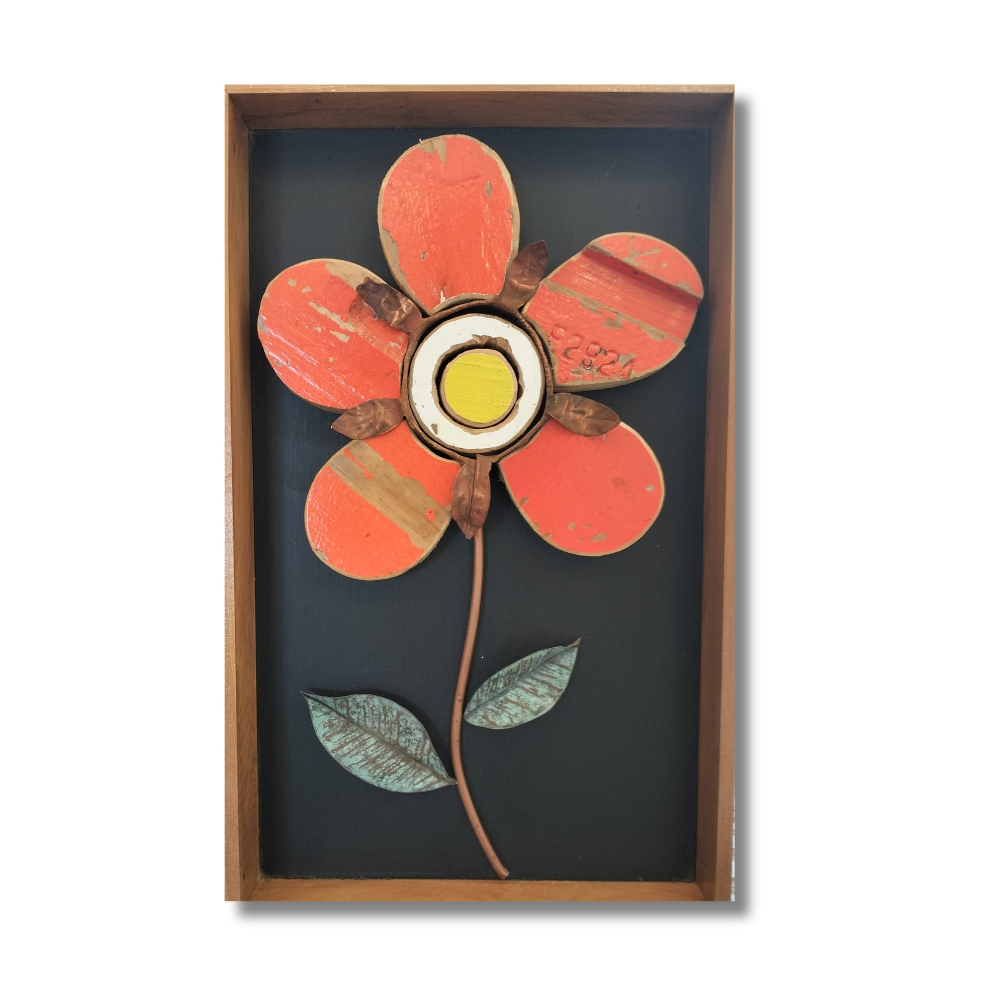 Orange Flower, original mixed media artwork by Lee Pritchard, reclaimed beehive wood petals with copper stem and leaves on navy background
