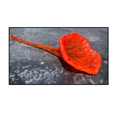 red glass blown flower by Heather Kremen