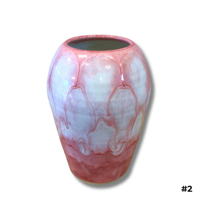 Handmade ceramic vase in pink and lavender glaze by Karene Fairey on white background

