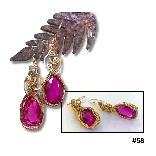 Teardrop pink sapphire drop earrings with gold-filled wire scrollwork by Diane Davidson