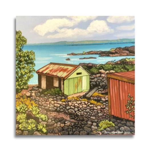 Rangitoto by John Staniford – acrylic painting of a New Zealand coastal bach with rocks, shoreline, and warm natural tones.