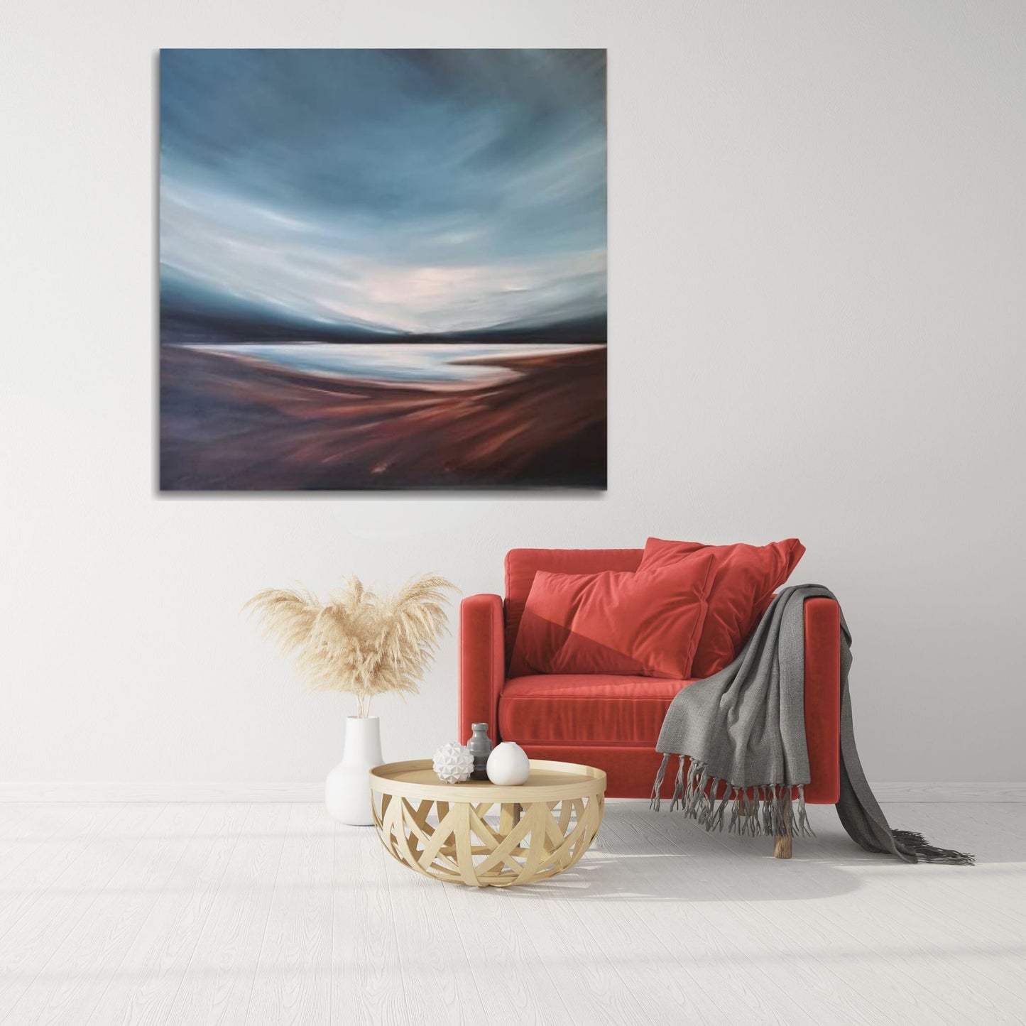 Abstract seascape painting by Tut Blumental featuring soft earthy foreground and pale blue sky, styled in a calm modern interior.