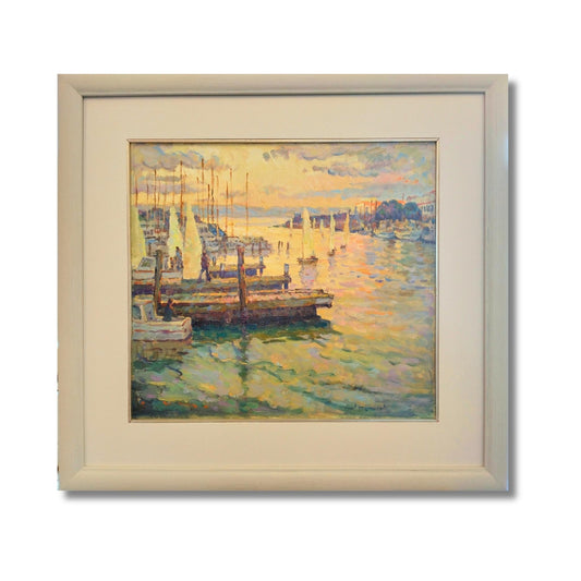 Framed painting by  Brown - End of the Day’s Sailing - Napier, showing sailboats, moorings and textured brushwork in golden, blue and green harbour reflections.
