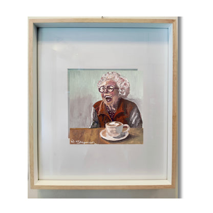 Gouache painting of a joyful elderly woman laughing over a coffee cup, framed and on a white background by New Zealand artist Wendy Shipman