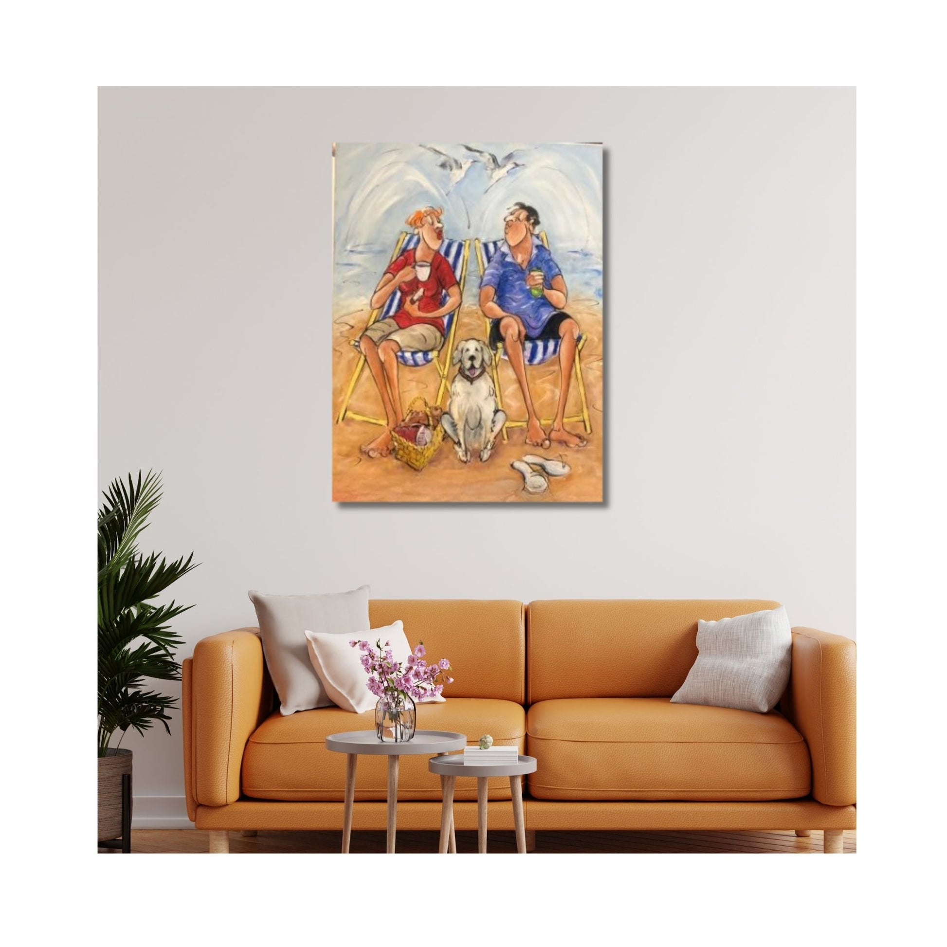 Original acrylic painting titled Summertime by Chloe King, depicting a man and woman on striped deck chairs at the beach with their dog and picnic basket in a mock up setting
