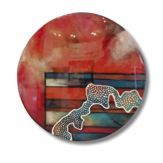 Original abstract circular acrylic painting with resin finish in deep reds, teal and earth tones with a dotted organic white-outlined form, by New Zealand artist Clare Wilcox, 49cm round canvas.
