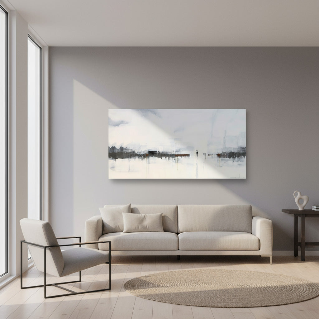 Modern living room with a light gray sofa, chair, and abstract painting on the wall.
