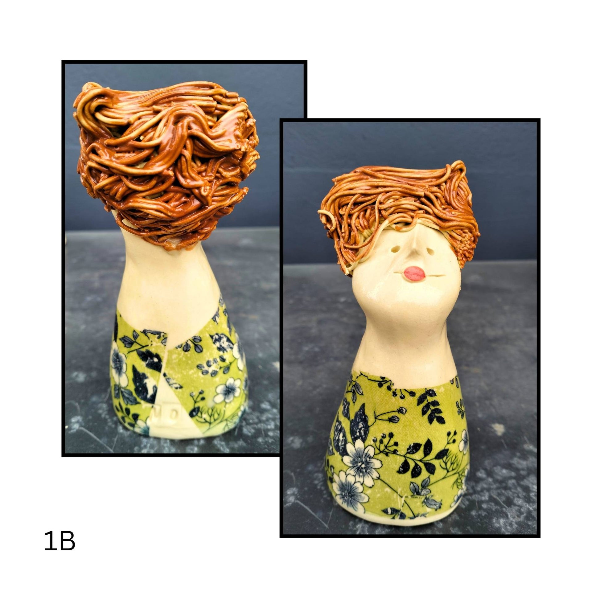 Hand-sculpted ceramic figure with rusty coloured hair and a jolive green floral dress