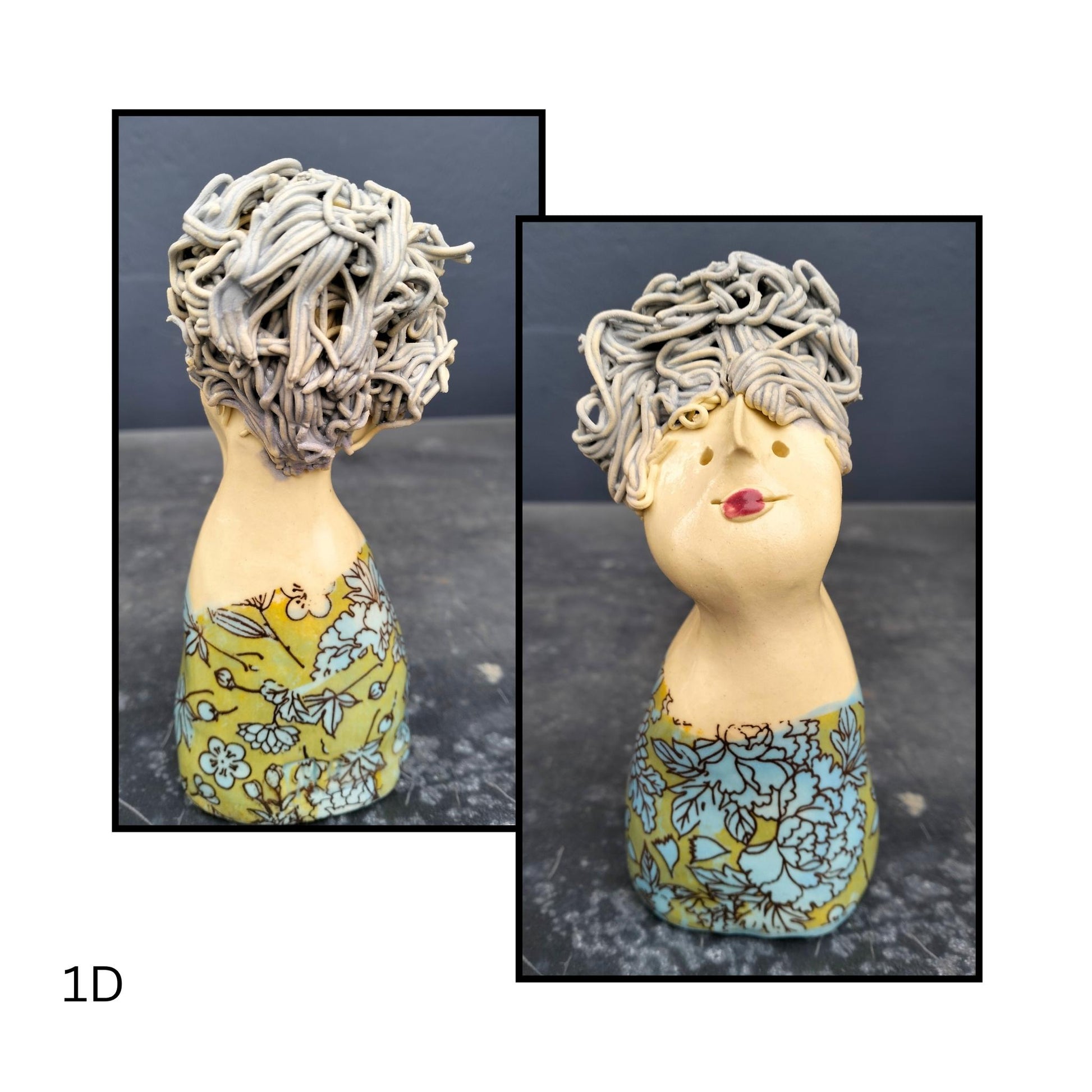 Small ceramic figure with tousled grey hair and a textured teal cand green outfit, radiating gentle wisdom.