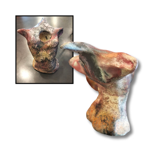 Small pit fired ceramic torso sculpture by Chloe Foster in maroon, white, and black marbled tones, handcrafted and organic