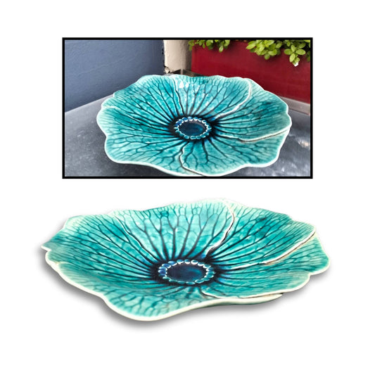 Turquoise ceramic waterlily bowl by Tom Sommerville with softly curved petal edges