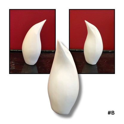 Single White Earthenware Clay hand sculptured Penguin, showing three different angles no. B by Louise Sweetapple
