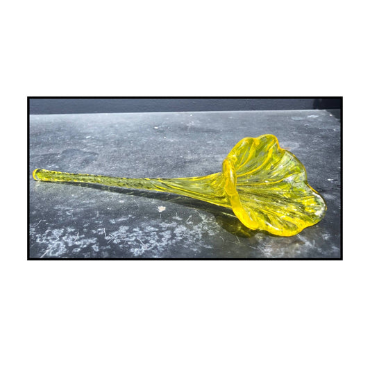 Yellow glass blown flower by Heather Kremen